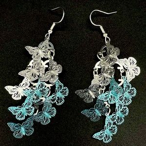 Silver and teal layered butterfly silver tone earrings